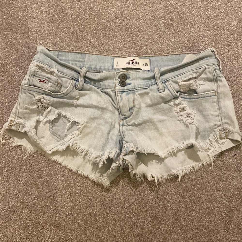 Distressed denim shorts.